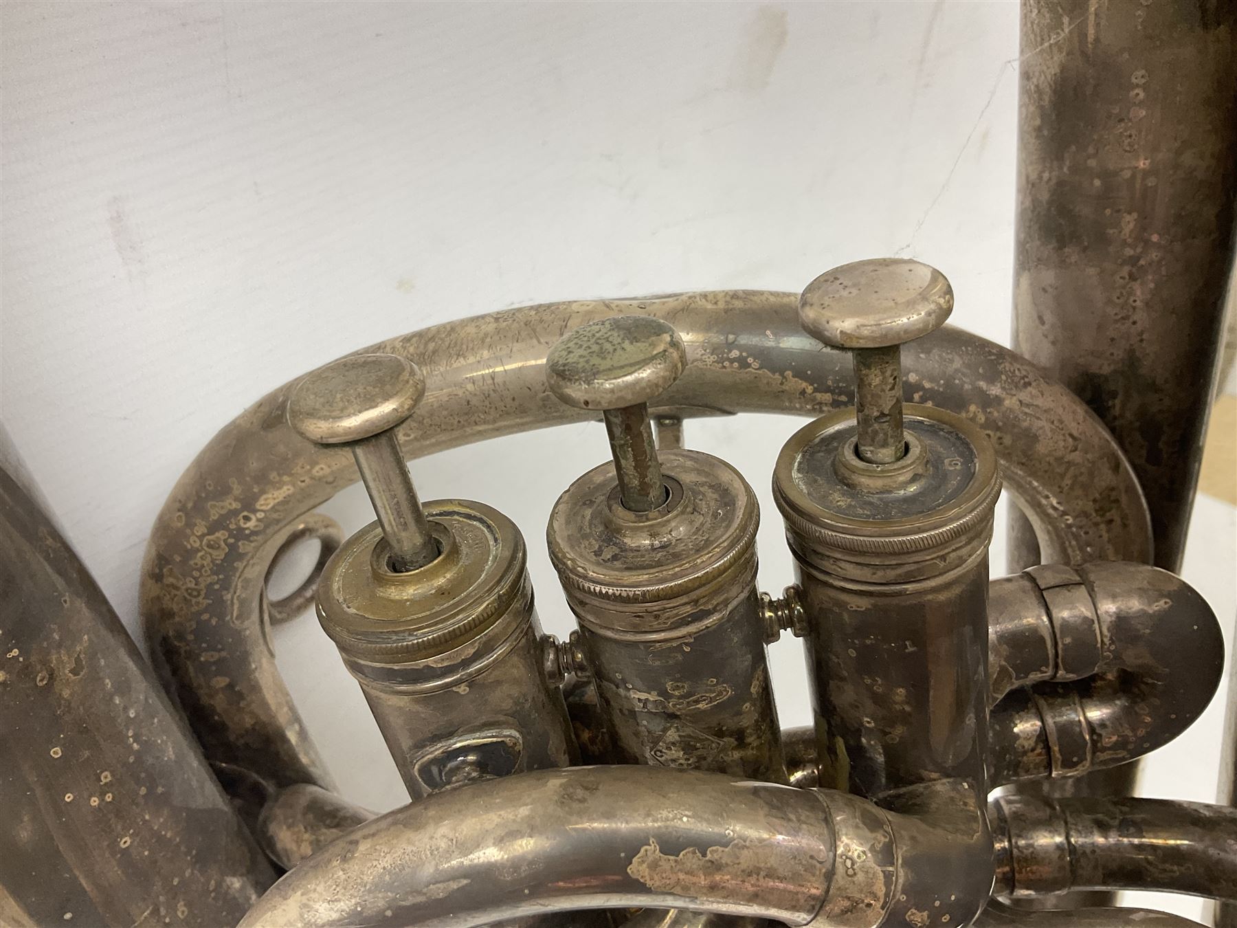 Boosey & Co silver plated 'Solbron' Class A Tuba c1920, serial number 102760, with compensating pistons and foliate engraved decoration H106cm 