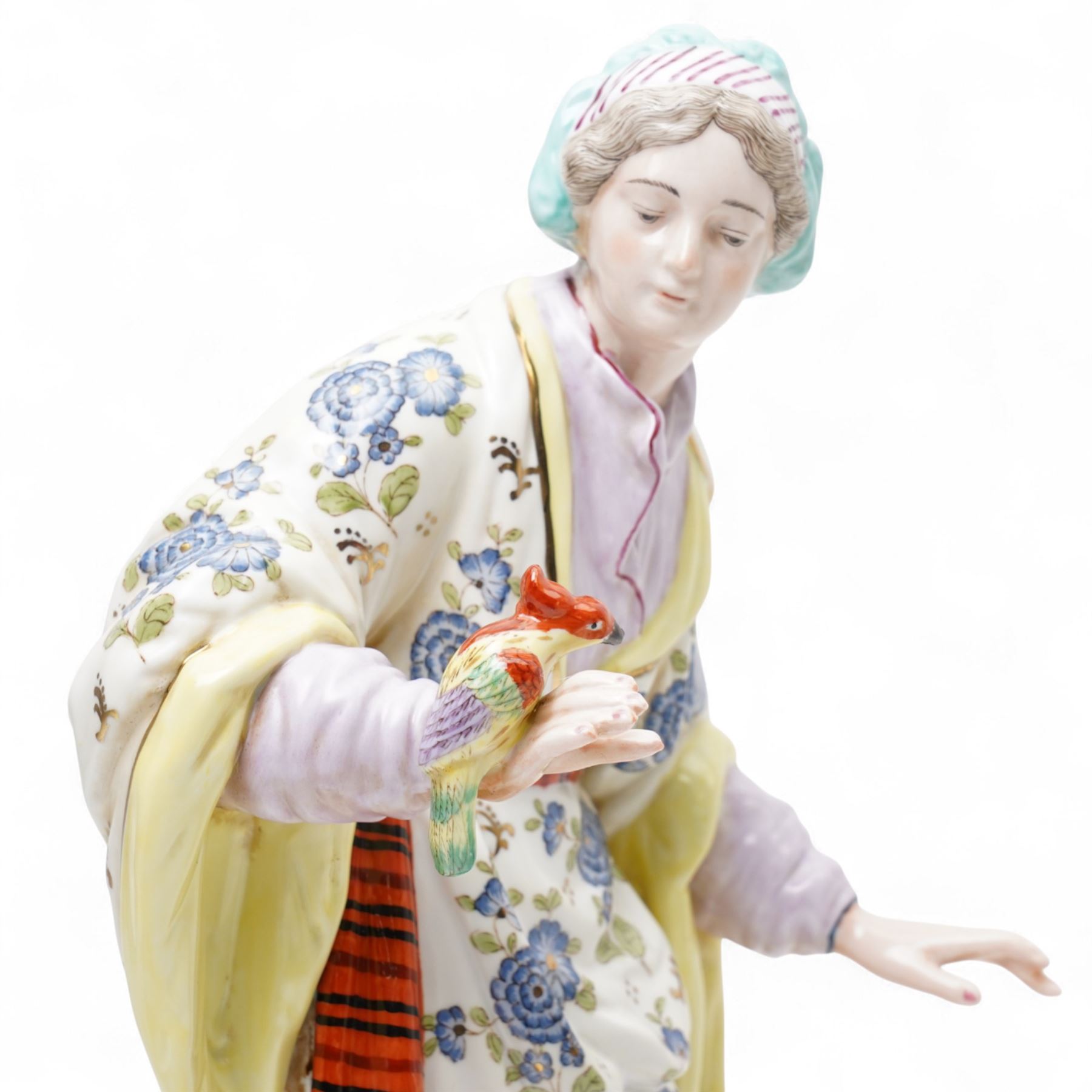 Pair of Continental polychrome Chinese male and female standing figures wearing floral robes H42cm