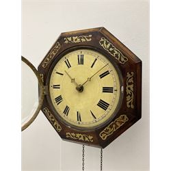 A German 19th century  “Postman’s” weight driven wall clock striking the hours on a gong, with a brass inlaid 14” hexagonal wooden bezel and a 9” painted dial with Roman numerals, minute track and cast brass hands within a spun bezel fitted with a convex glass.  With pendulum no weights .