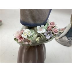 Three Lladro figures, comprising Pondering, no 5173, Nostalgia, no 5071 and Nature's Bounty, no 1417, all with original boxes, largest example H27cm