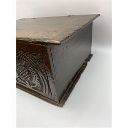 18th century oak bible box, the hinged lid with chip-carved decoration, the front with iron lock, carved with thistles in lunettes and foliate spandrels, H21cm L54cm D36cm