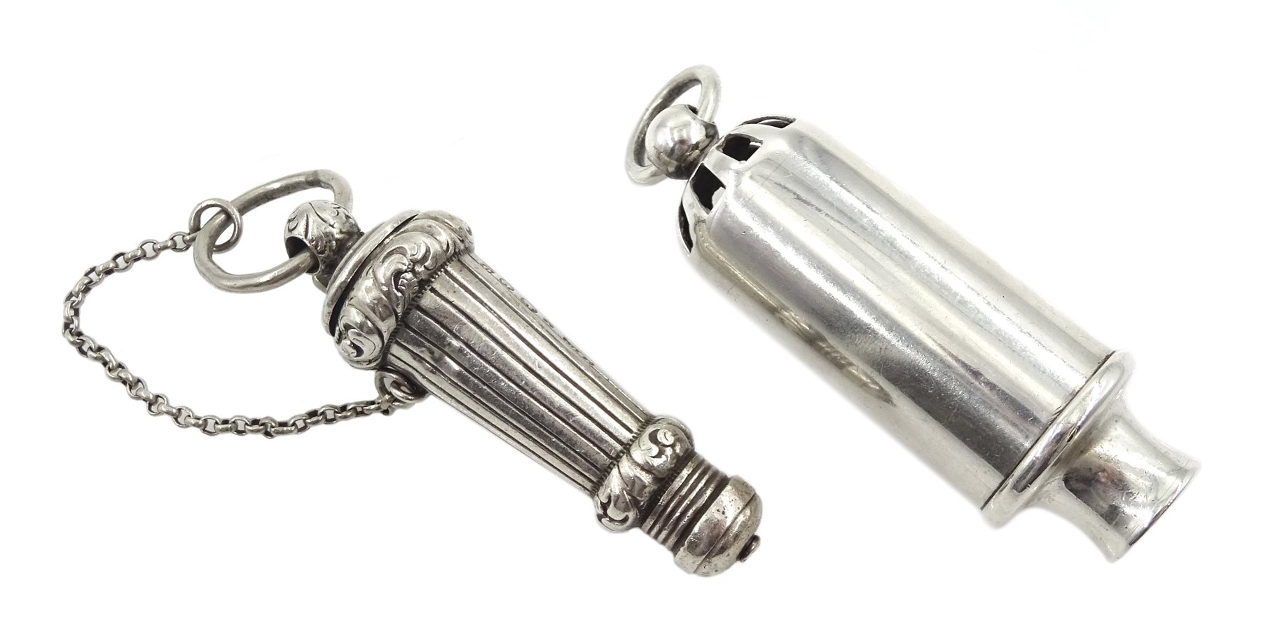 Edwardian silver whistle by William Hornby, London 1902, the metal interior stamped Huloons patent and a Victorian silver whistle, in a silver reeded case by Joseph Jennens & Co, Birmingham 1863