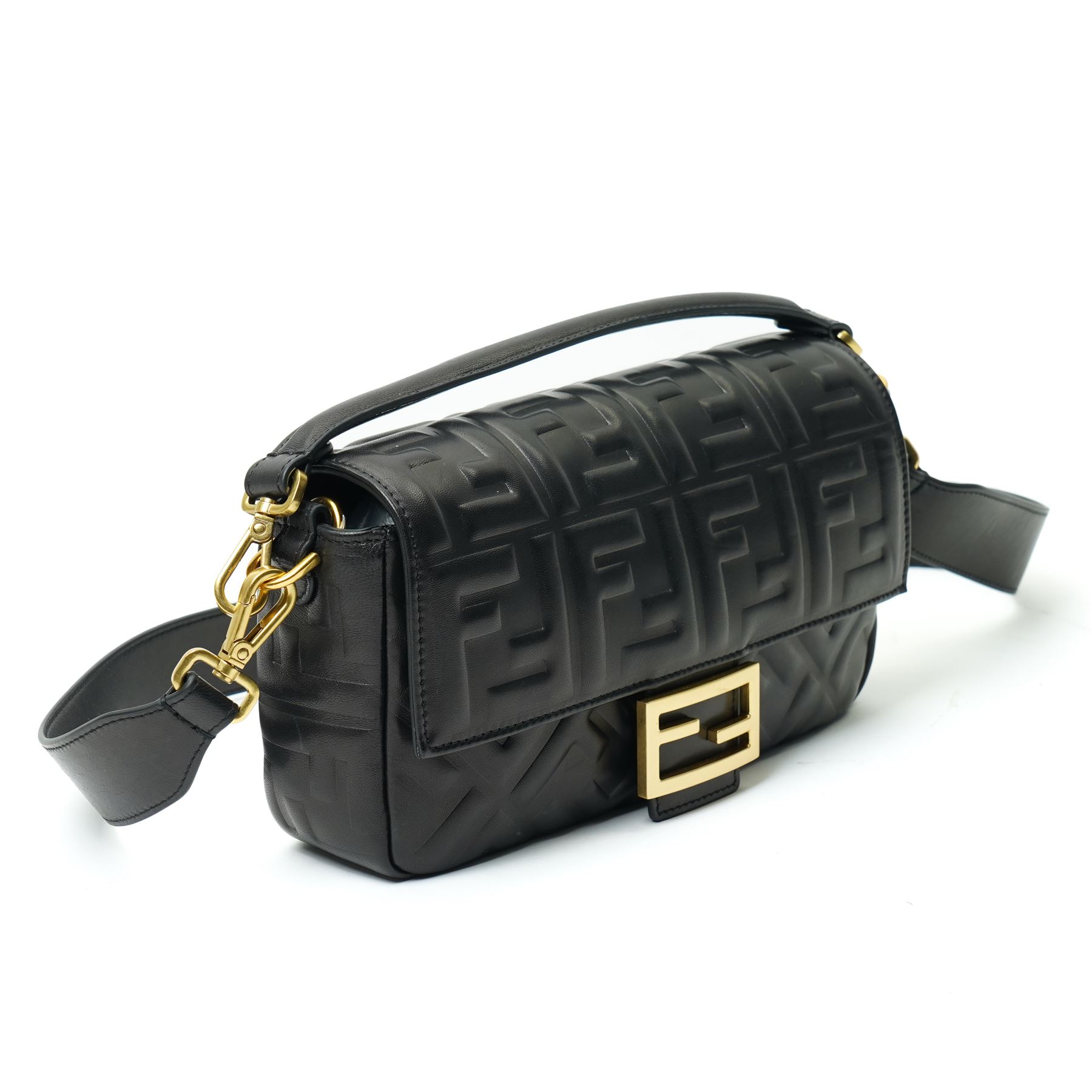 Fendi Baguette shoulder bag, black nappa leather with embossed FF monogram and quilted panels, the front flap secured by a gold-tone FF logo magnetic clasp engraved Fendi Made in Italy, with detachable leather shoulder strap and gold-tone hardware, interior leather tab stamped 'Baguette Fendi Made in Italy', together with original Fendi dust bag and box, W27cm D7cm H15cm