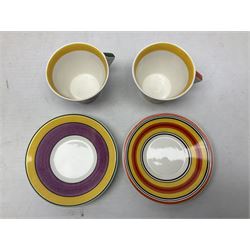 Wedgwood limited edition Clarice Cliff Design Taking Tea collection, comprising eight cups and saucers Honolulu, Apples, Gibraltar, Lilac Crocus, Trees and House, Coral Firs, Devon, and Sunray, with certificates of authenticity 