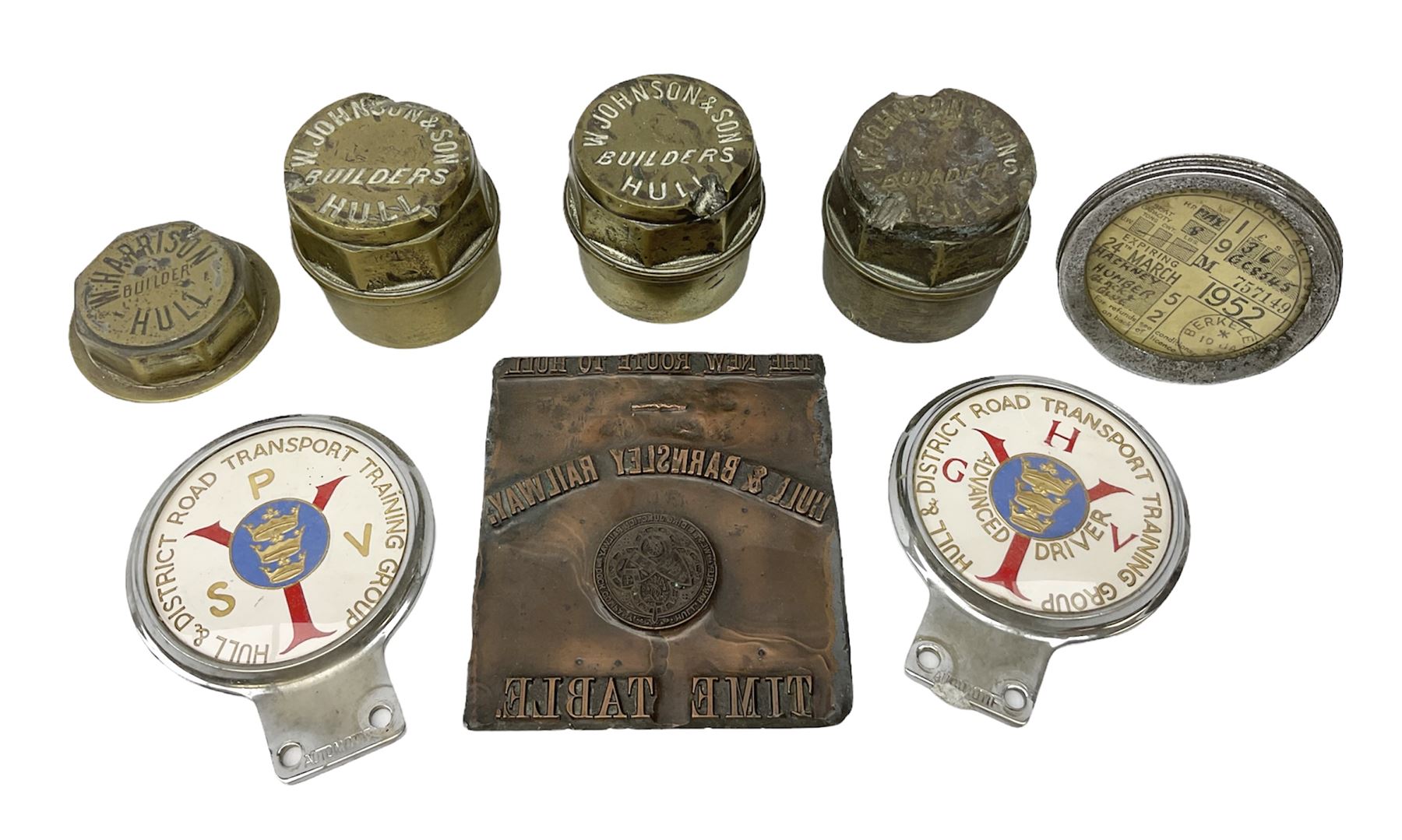 Three brass cart wheel hub caps for W. Johnson & Son Builders Hull, another for W. Harrison Builder Hull, copper printing plate for Hull & Barnsley Railway Timetable, two Hull & District Road Transport Training Group Advanced Driver car badges and framed 1952 car road task disc (8)  