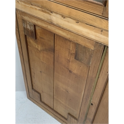 Large late 19th century sycamore corner cabinet, the top section with two astragal glazed doors enclosing two shaped shelves, the lower section enclosed by two panelled doors with square spandrels, W128cm, H215cm