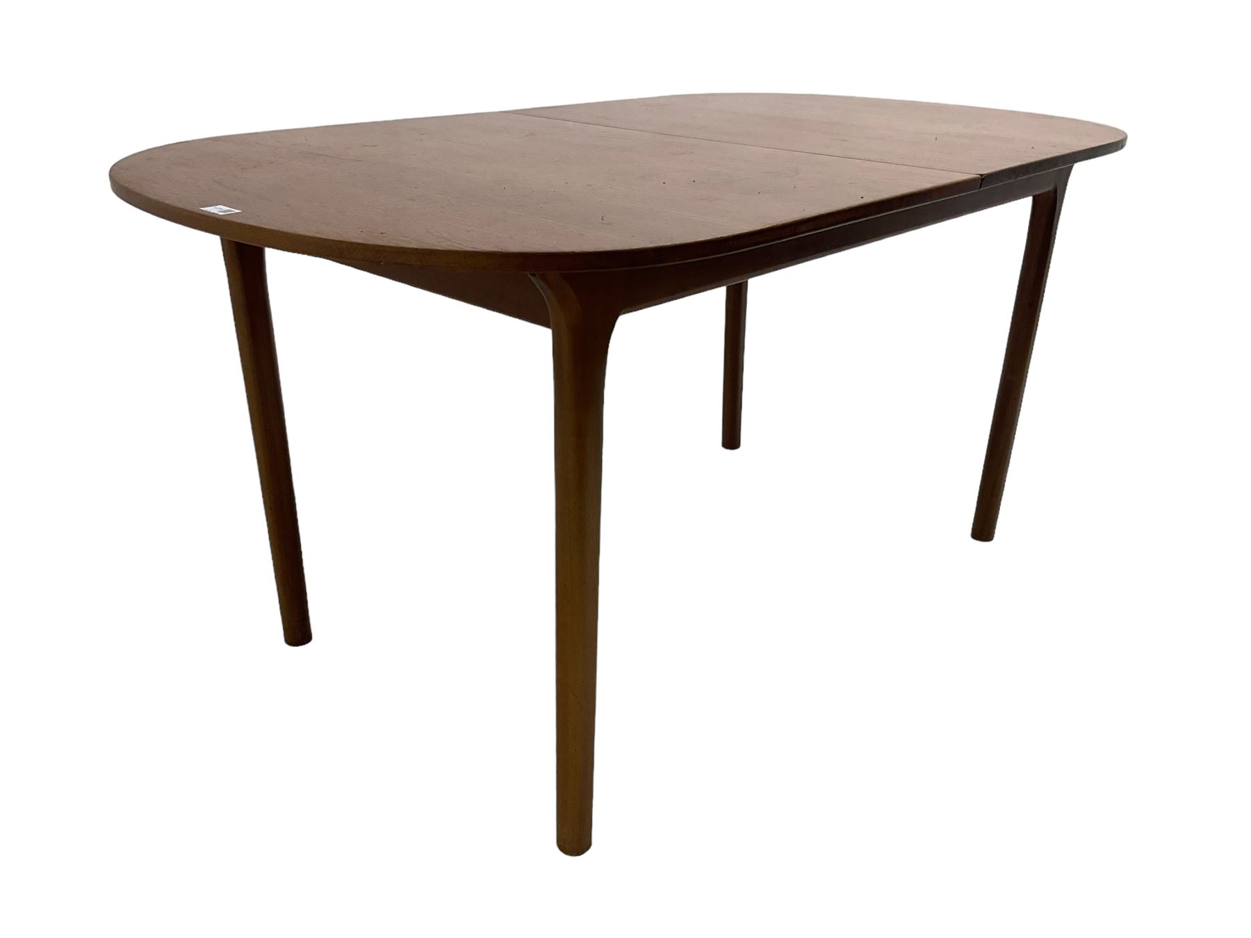 AH McIntosh & Co of Kirkaldy - mid-20th century teak extending dining table, rectangular top with rounded corners, concealed integrated double leaf, raised on tapered supports, 'Furniture by McIntosh sticker to underside of leaf
