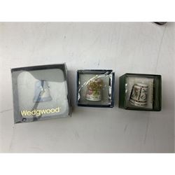 Quantity of thimbles to include twelve Irish Dresden lace examples, Royal Crown Derby, Spode, Portmeirion, Wedgwood, Royal Grafton etc, together with three display cases, many with certificates