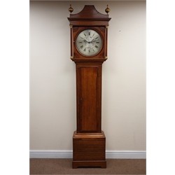  Early 19th century mahogany banded oak longcase clock, 33cm circular silvered Roman dial with Arabic five minute divisions, inscribed Kidd Malton, pagoda top hood with inlaid spandrels, turned columns and finials, 30 hour movement striking the hours on a bell, H210cm   