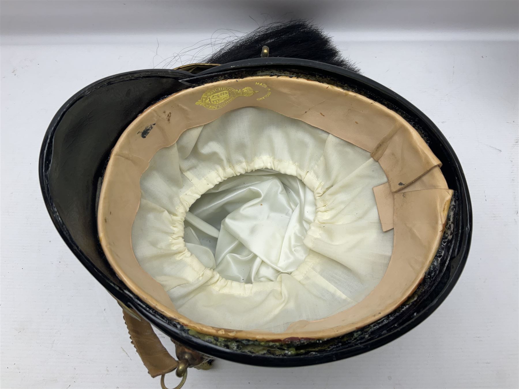 Lancers cap with original 19th century fittings for the 16th Lancers on a modern fibre glass shell with liner