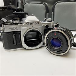 Canon AE1 camera, 'no. 4403757', fitted with Canon 'FD 50mm 1:1.8' lens, Hoya 'HMC Wide-Auto f24mm 1:2.8' lens and various other lenses and camera accessories, housed in a soft carry bag