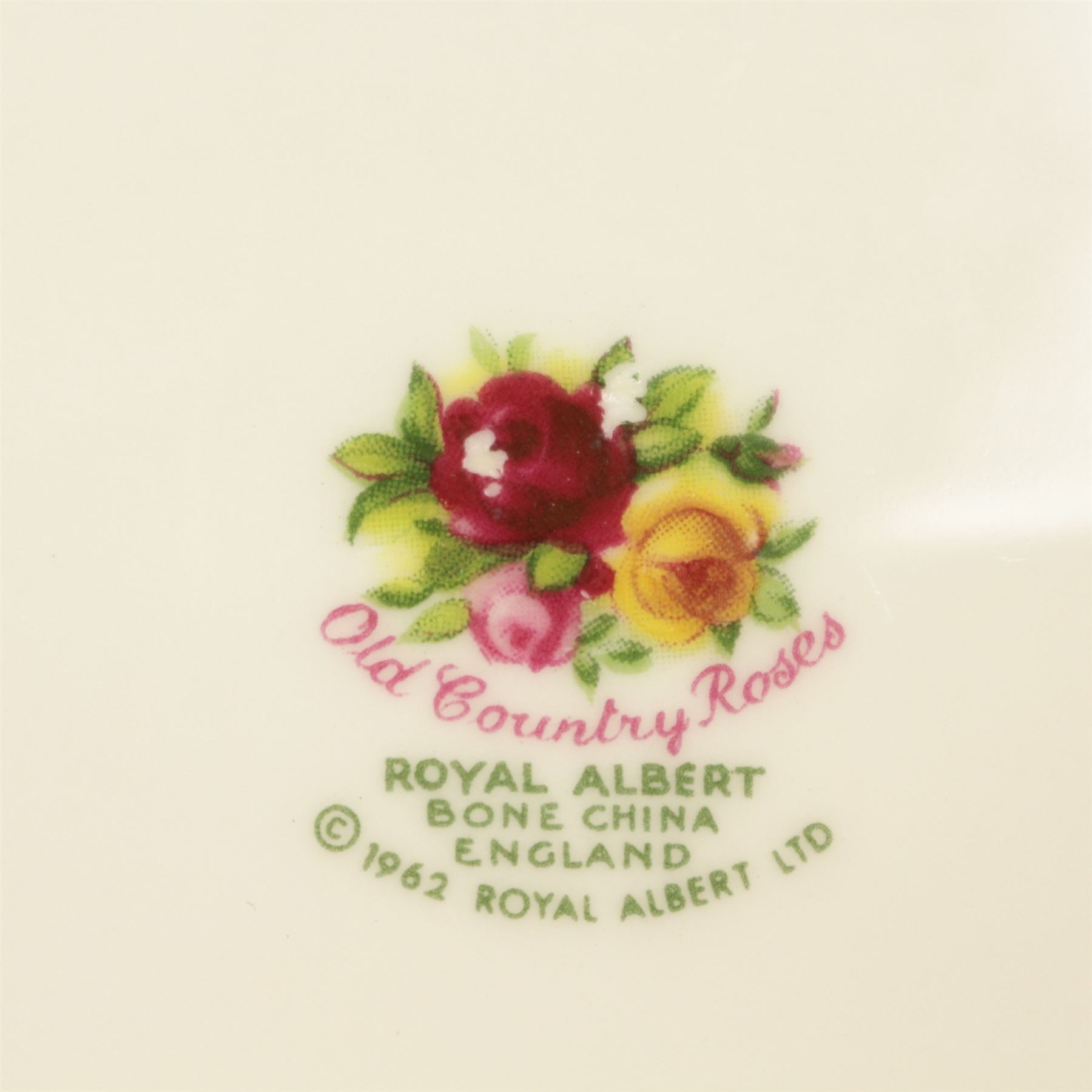 Royal Albert Country Roses tea and dinner service, teapot, milk jug, covered sucrier, eight dinner plates, eight teacups and saucers 