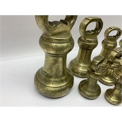 Set of seventeen Victorian brass bell weights