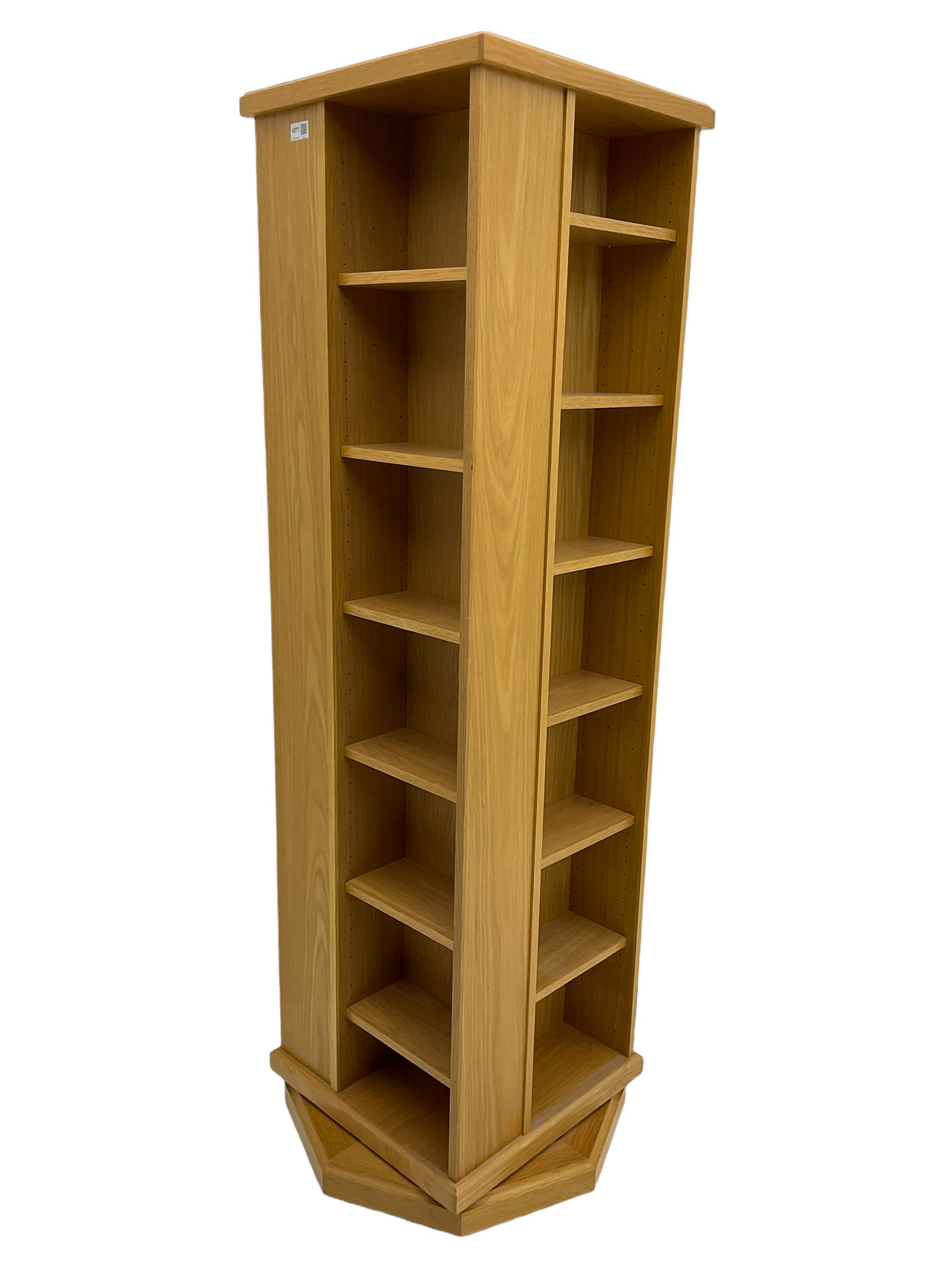 Light oak revolving CD storage trinket tower, adjustable shelves
