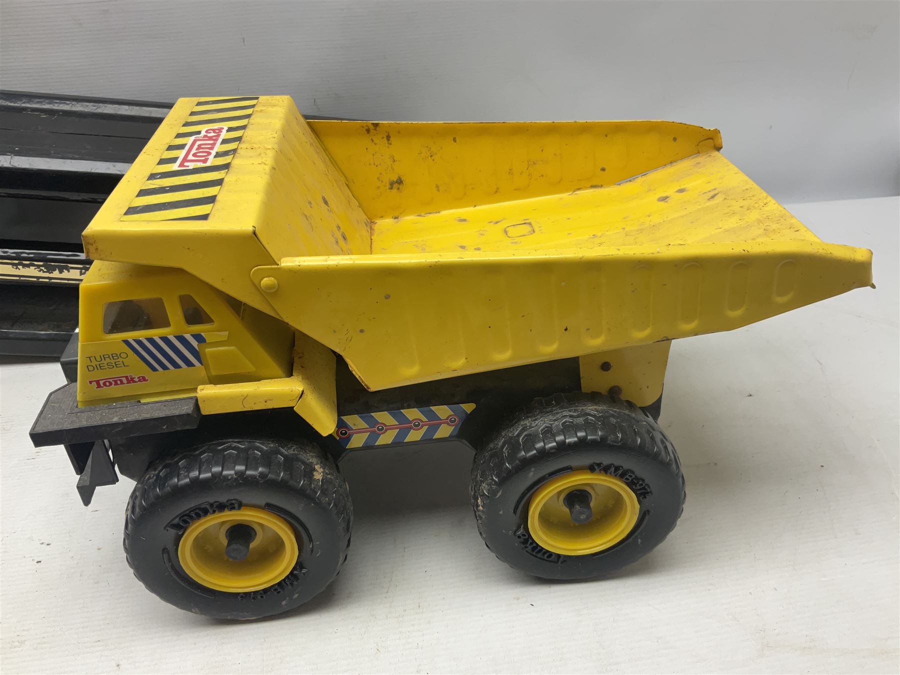 Tonka - five large scale steel pressed vehicles comprising Cement Mixer, Car Transporter, Mobile Crane and two Dumper Trucks (5)