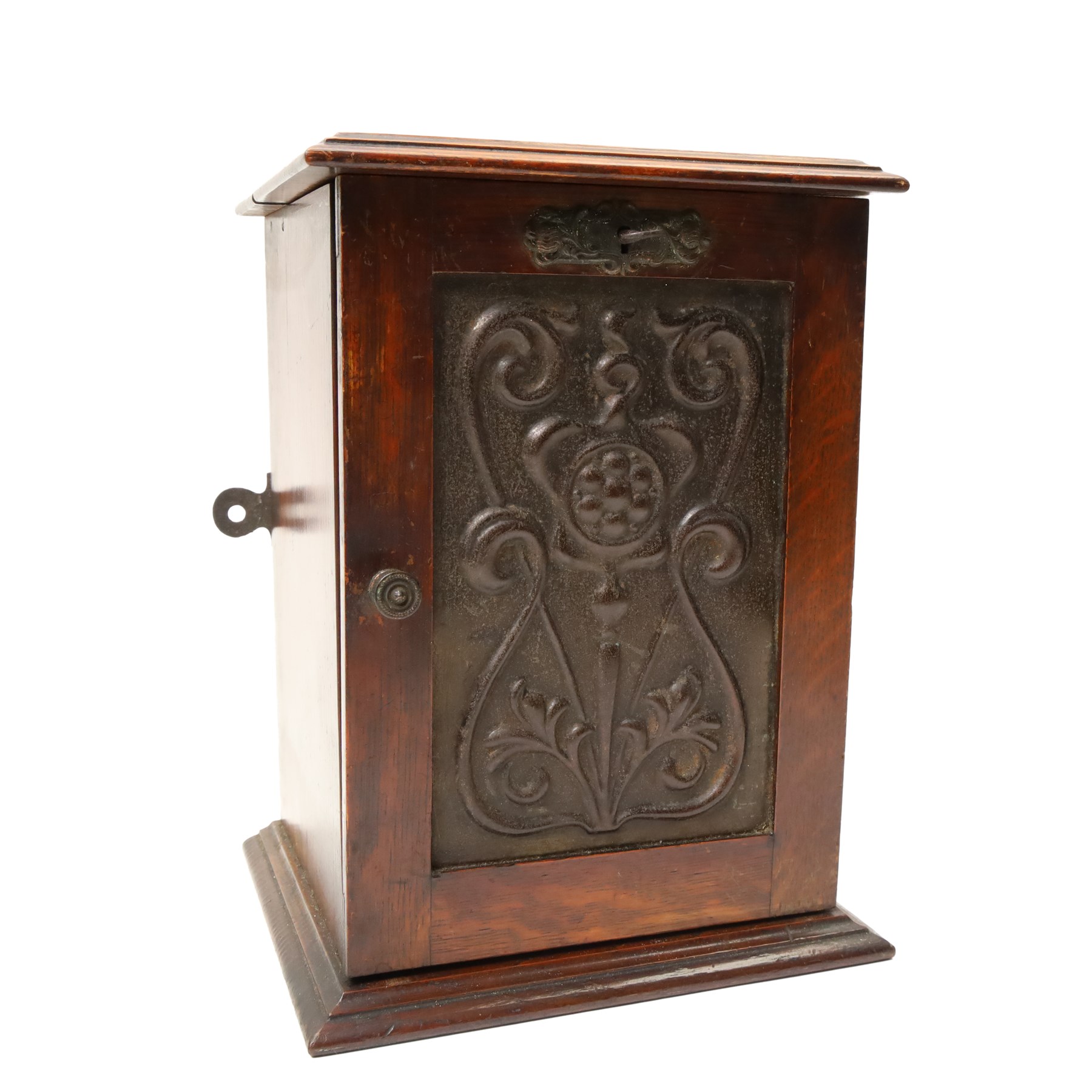 Edwardian oak smokers cabinet with carved panel door and hinged lid and a collection of various pipes and other items