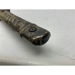 Copy of a WWII Japanese NCO sword, the 65cm slightly curving blade stamped with pseudo Japanese characters and cast brass simulated cord bound grip; in officer's leather bound field scabbard L97cm overall