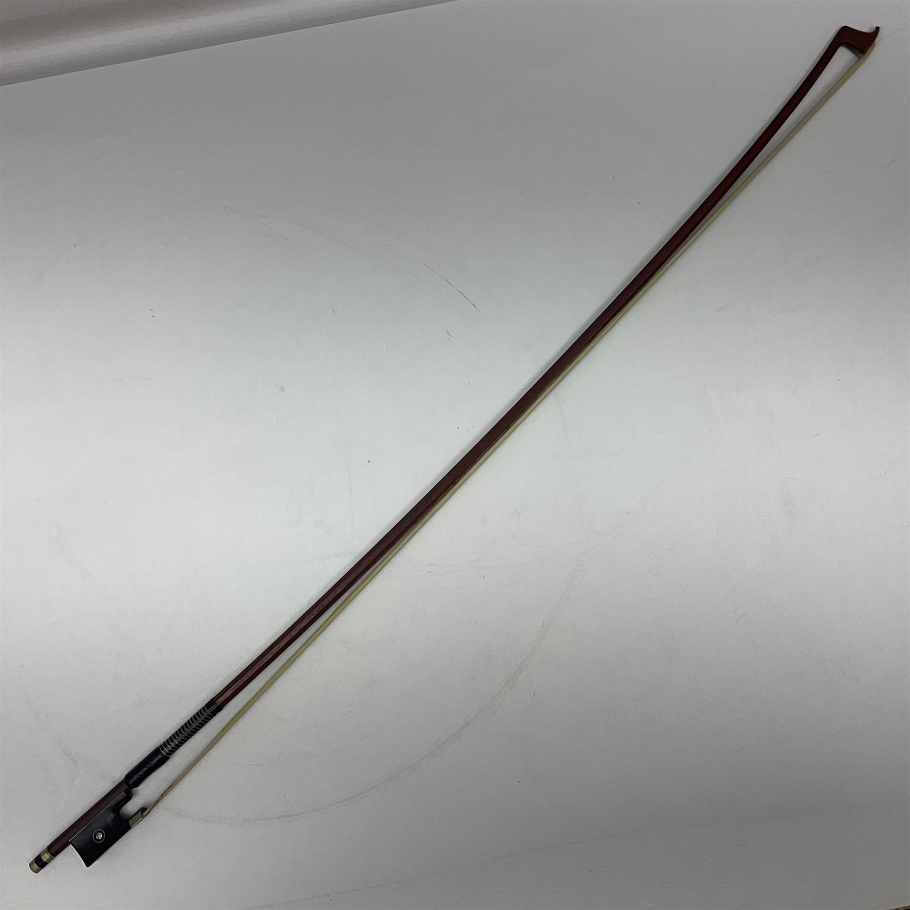 Nickel mounted pernambuco violin bow stamped R. Paesold L73.5cm
