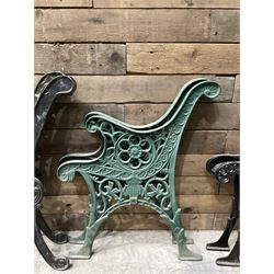 Four pairs of ornate cast iron bench ends (8)