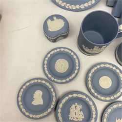 Quantity of Wedgwood Jasperware to include small dishes, lidded boxes and two mugs