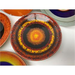 Poole Pottery The Planets, set of nine chargers 'The Planets, by Alan Clarke, comprising Mars, Mercury, Neptune, Venus, Uranus, Pluto, Jupiter, Saturn and Earth, all with original boxes and certificate, D27cm 