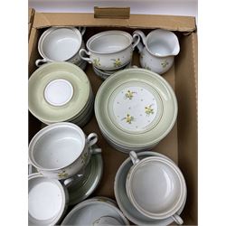 Quantity of Denby Verona pattern tea and dinner wares, decorated with floral sprays and within green borders, to include lidded twin handled bowls, teacups and saucers, dinner plates etc in two boxes