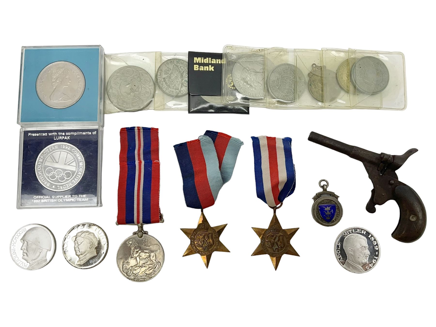 WW2 group of three medals comprising 1939-1945 War Medal, France & Germany Star and 1939-1945 Star; all with ribbons; 1930s Hull Savings Bank silver and enamel presentation fob; three medallions depicting Hitler, Mussolini and Mao Tse Tung; quantity of modern crowns and other coins; and a 6mm Flobert style starting pistol