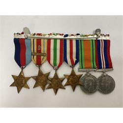 WWII group of six medals comprising 1939-45 Star, The Africa Star, The Italy Star, France and Germany Star, Defence Medal and War Medal 1939-45, awarded to 7899181 RAC C.W Hughes, together with two chevrons and ephemera relating to Charles William 'Bill' Hughes including Soldier's Release Book, photographs, certificates of transfers etc 