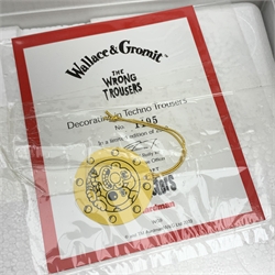 A group of six Coalport Wallace & Gromit figurines, comprising 'Hold on Gromit' no880/2000 with certificate, 'Decorating in Techno Trousers' no1195/2000 with certificate, 'Reading for Take Off', 'Do something Gromit', 'Feathers in disguise', 'Happy Birthday Gromit', each in maker's box with accompanying swing tag.