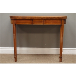  Early 19th century mahogany card table, fold over top with oval and segmented inlay, double action gateleg base, square tapering supports with spade feet, W92cm, H74cm, D46cm  