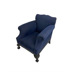 Georgian style armchair, shaped cresting upholstered in blue fabric with stud band, on black lacquered frame, scroll decorated frieze rails and acanthus carved ball and claw feet