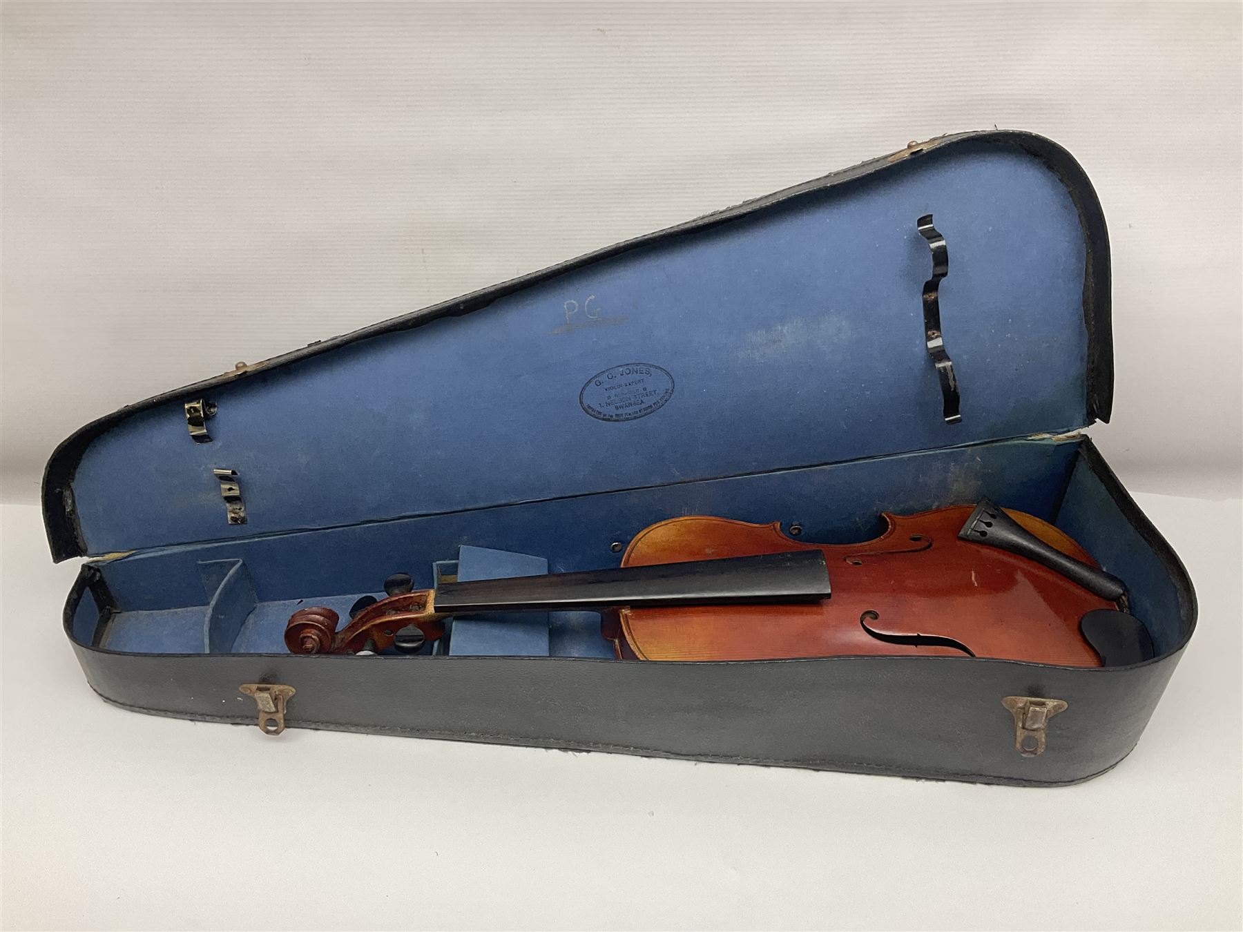 Late 19th century French three-quarter size 'Conservatory' violin with 34cm two-piece maple back and ribs and spruce top, the peg box inscribed 'Conservatory Violin Straduari', bears label 'Antonius Stradiuarius Cremonensis Faciebat Anno 1721' L55.5cm overall; in ebonised wooden 'coffin' case; and Saxony violin c1900 with 36cm two-piece maple back and ribs and spruce top; bears label 'Antonius Stradivarius Cremonensis Faciebat Anno 17**' L59cm overall; in carrying case (2)