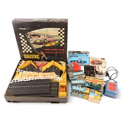 Tri-ang Scalextric Model Motor Racing set C.M.3, with five Tri-ang Scalextric slot car models, including Lotus 1961 in blue, Lotus 1961 in green, Typhoon motorbike and sidecar, B12 Hurricane motorbike and sidecar and Aston Martin DB4 GT,  all boxed, together with Merit Racing Car Assembly Kit, kit built Revell Model Racer Mercedes Benz 300SL Coupe, part built Revell Triumph TR4, Indi-Novi-Ferguson slot car and other accessories 