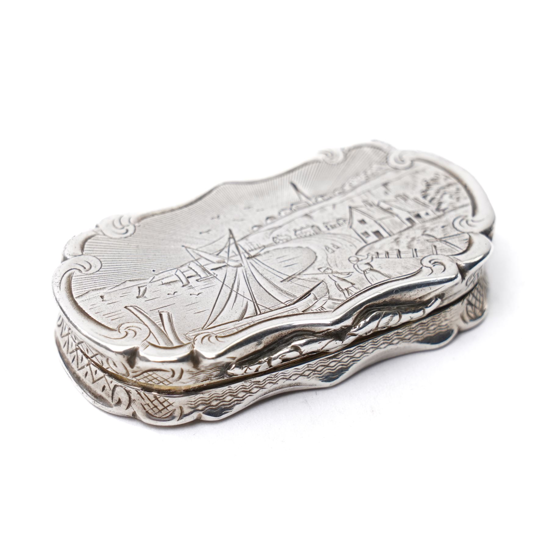 Victorian silver castle top vinaigrette engraved with a scene of Folkestone Harbour, hinged grille Birmingham 1846 Maker Nathaniel Mills