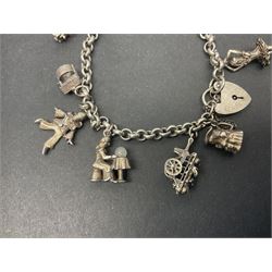 Silver charm bracelet, with ten charms including fortune teller, wishing well, crown, toby jug, ballerina and a heart padlock clasp