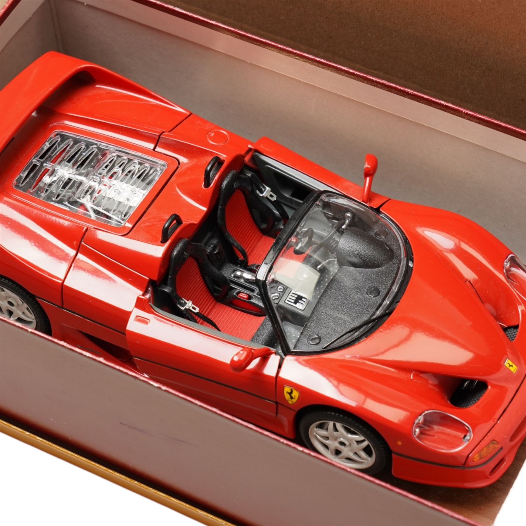 Collection of Burago cars including Ferrari 360 Modena, two Jaguar E Coupes, Ferrari 500 Maranello all boxed and Ferrari F50 (5) 