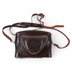 Leica DBP M3 35mm rangefinder camera body, serial no. 1038356, circa 1961, in chrome finish, housed in brown leather Leica case, with a Leitz Wetzlar Sunnilux 1:1.4/50 lens serial no. 1845148, Leitz Wetzlar Elmar 1:4/135 lens serial no. 1825980, 12575N hood, 12521G hood, Leica Meter MC serial no. 99015, Sunpak Auto28 SR Thyristor, Linhof 3 Way Pan tripod, and a Toshiba PE-1 Linear Exposure meter, all housed in an Original Benser Everready Case, most items with instruction booklets 