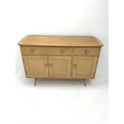 Ercol elm sideboard, one long and one short drawers above two drawers, turned supports