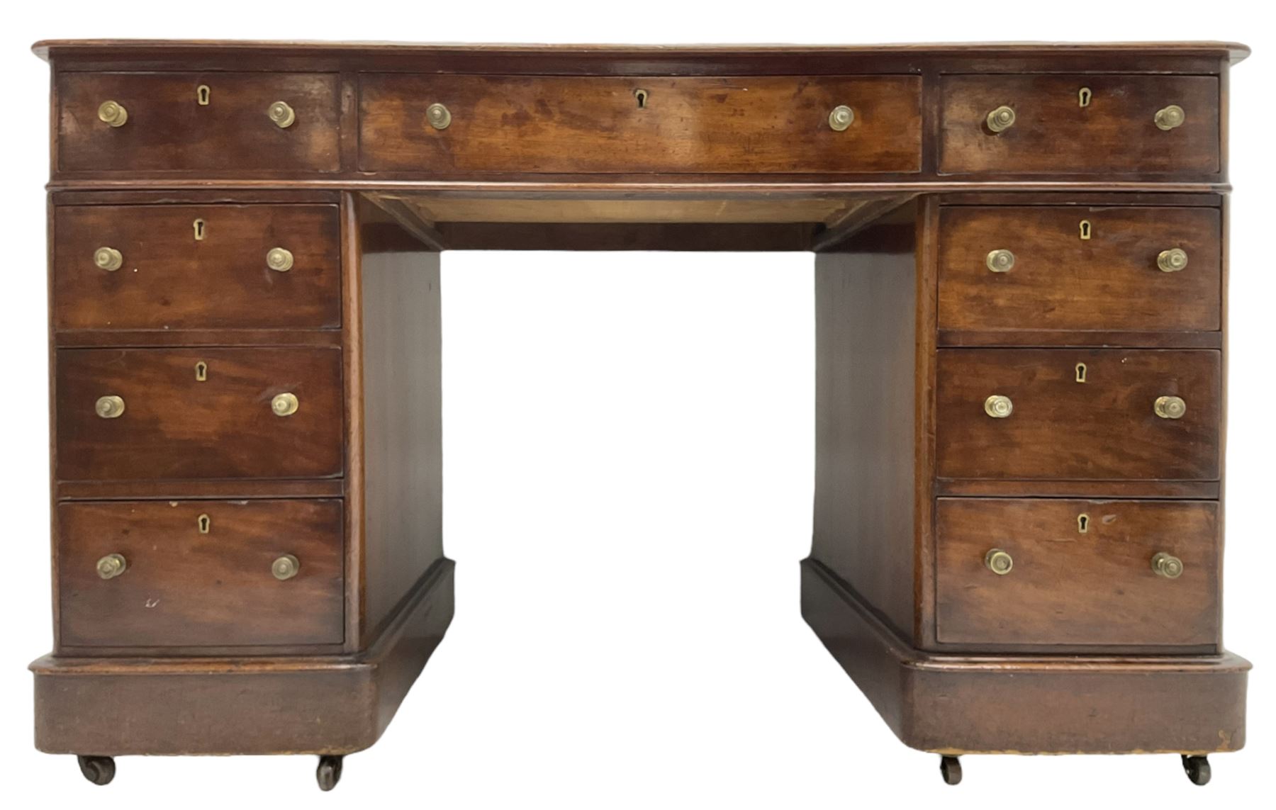 Victorian mahogany twin pedestal desk, rectangular top with inset ebonised leather writing surface, fitted with nine graduating drawers with brass pull handles, on plinth bases