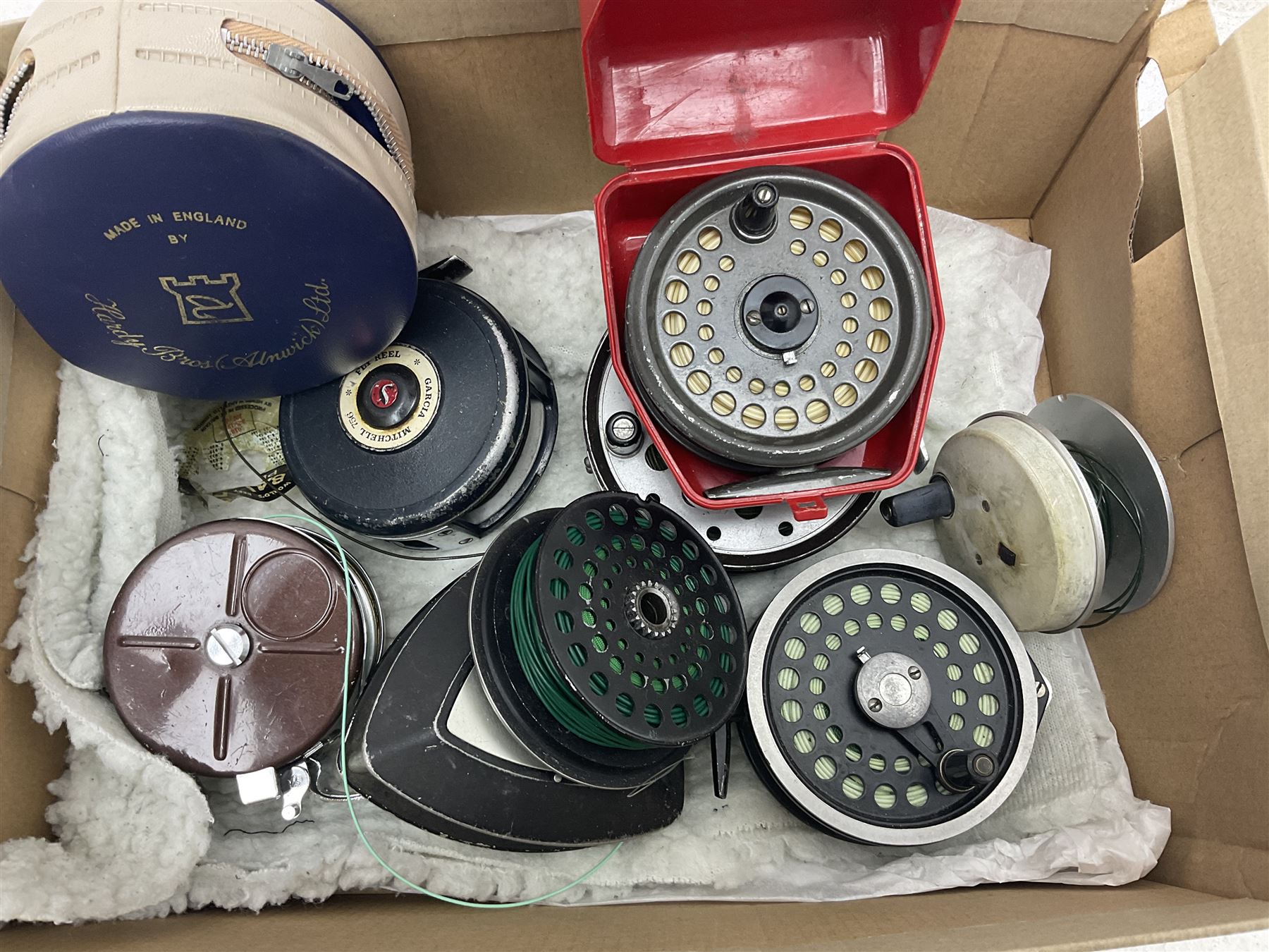 Hardy 'The Palakona' split cane fly fishing rod, Shakespeare Flymaster Composite rod and a Shakespeare Sigma Graphite rod, collection of fly reels including Farlow's Serpent, Abu Svangsta Delta 3 and Intrepid Gearfly and three trout fly fishing books