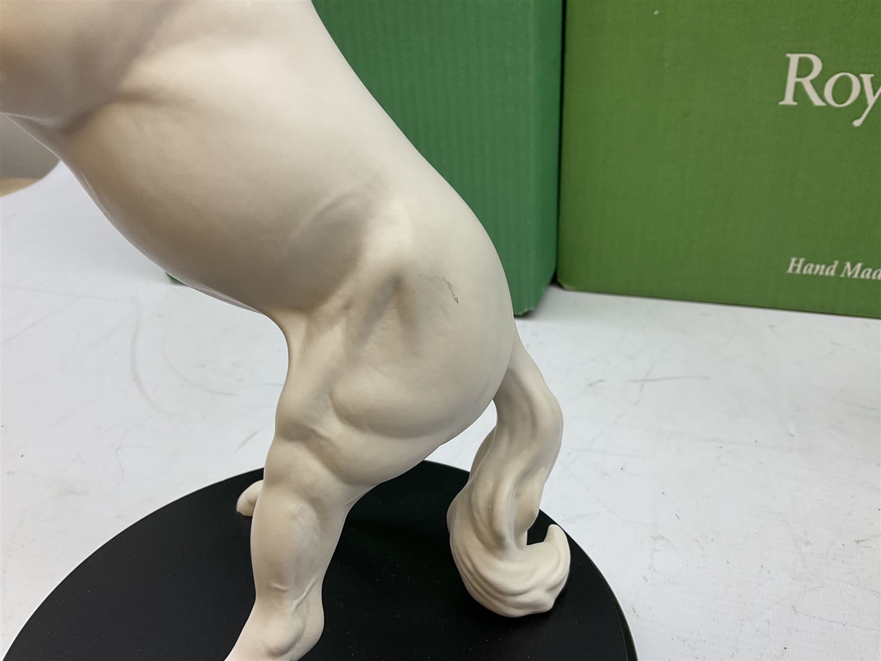 Five Beswick and Royal Doulton horse figures in matt white on black plinths, comprising of  Spirit of Affection no. 2689/2536, Springtime no.2837, Spirit of peace no.2916, Spirit of earth no.2914 and Spirit of the wild no. 183, together with a composite figure of a horse (6)