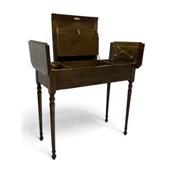 Edwardian oak metamorphic 'Britisher Writing Table', rectangular hinged top revealing correspondence compartments and hinged writing surface with underside storage, flanked by twin hinged compartments with dividers, on turned supports