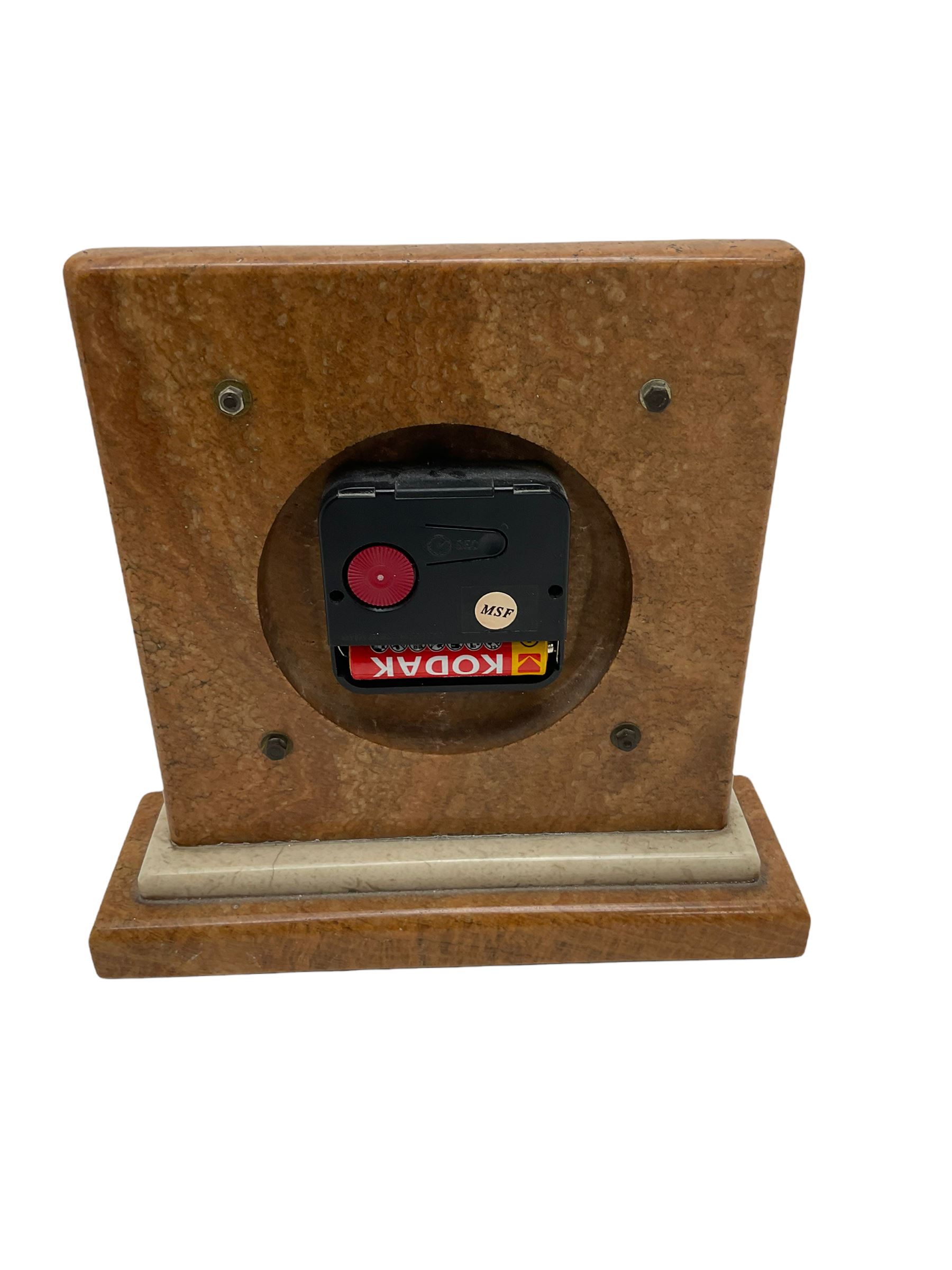 Battery driven marble mantel clock in the Art Deco style and a brass finished carriage clock. Both with quartz movements