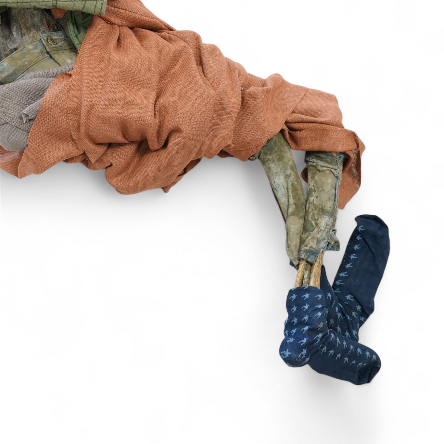 FILM PROPS; Three decomposing prop cadavers, collection of three life-size decomposing cadaver or dead body props, featuring skeletal elements, exposed flesh, and period clothing, each with articulated joints and limbs, likely from a TV or film production, each prop displays intricate detailing with realistic aging and weathering, together with post mortem cards detailing circumstances of death and identity, with two associated body bags max 160cm (3) 
Notes: the post-mortem cards correlate to a plane crash in 1972 - the Uruguay Air Force Flight 571 in the Andes Mountains; two movies were made about this event. Allegedly, the survivors resorted to cannibalism. 