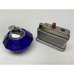 Collection of lighters, including Ronson Varaflame, Zorr Classic, Dunhill bark effect roller gas lighter, and faceted blue glass table lighter, etc