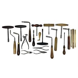 Collection of twenty-two piano tuning and servicing tools by Marples, Reynolds, Fletcher etc including T tuning levers and wrenches, Papps wedge treble mute and stick mutes, regulatory screw-driver, tuning hammers, various pliers etc