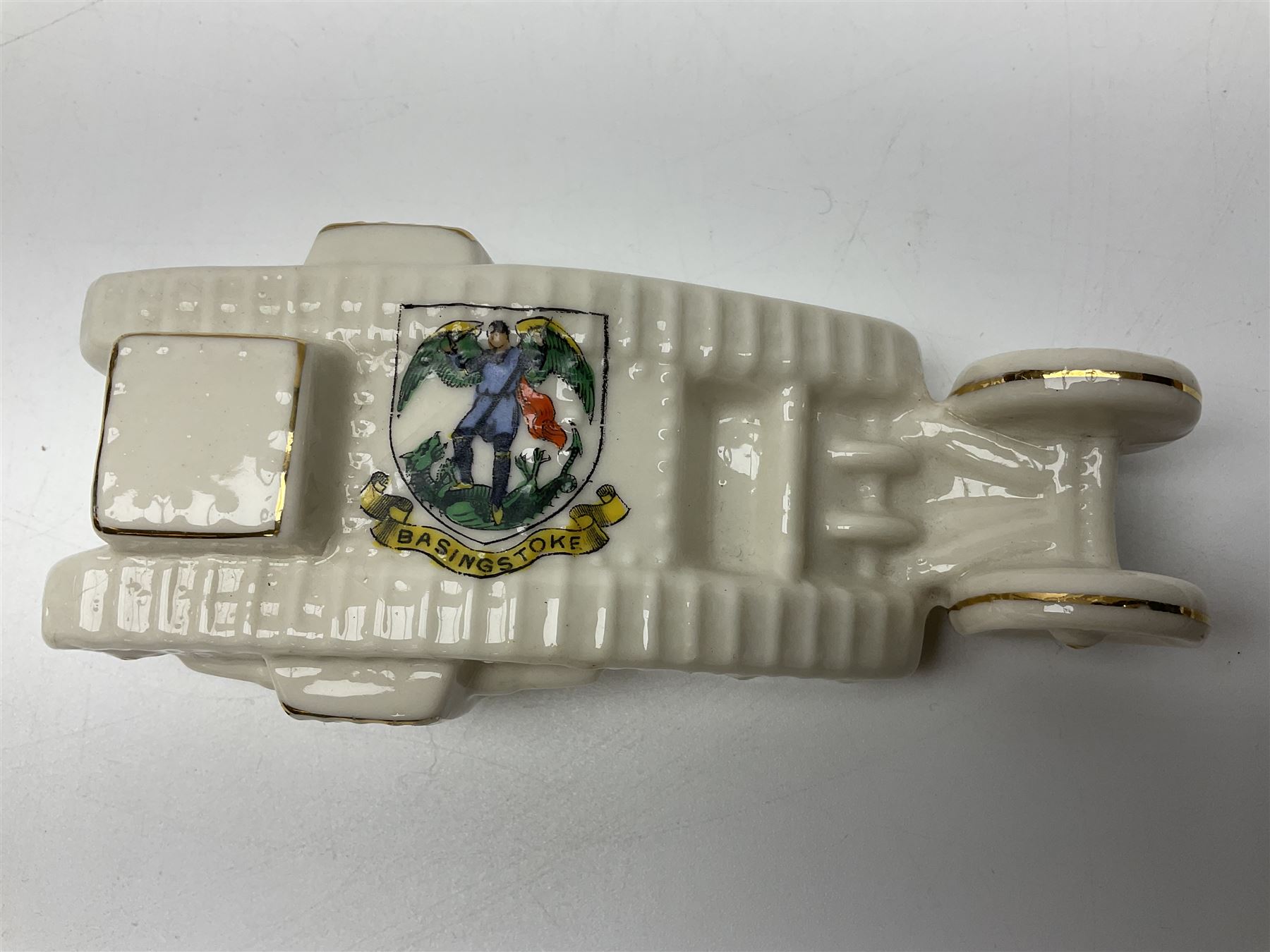 Ten WW1 crested china military models of tanks and field guns; various makers including Goss, Grafton China, Arcadian China, Savoy China etc; various crests including Portsmouth, Brighton, Pendleton, Paignton, Cowes, Flamborough etc (10)