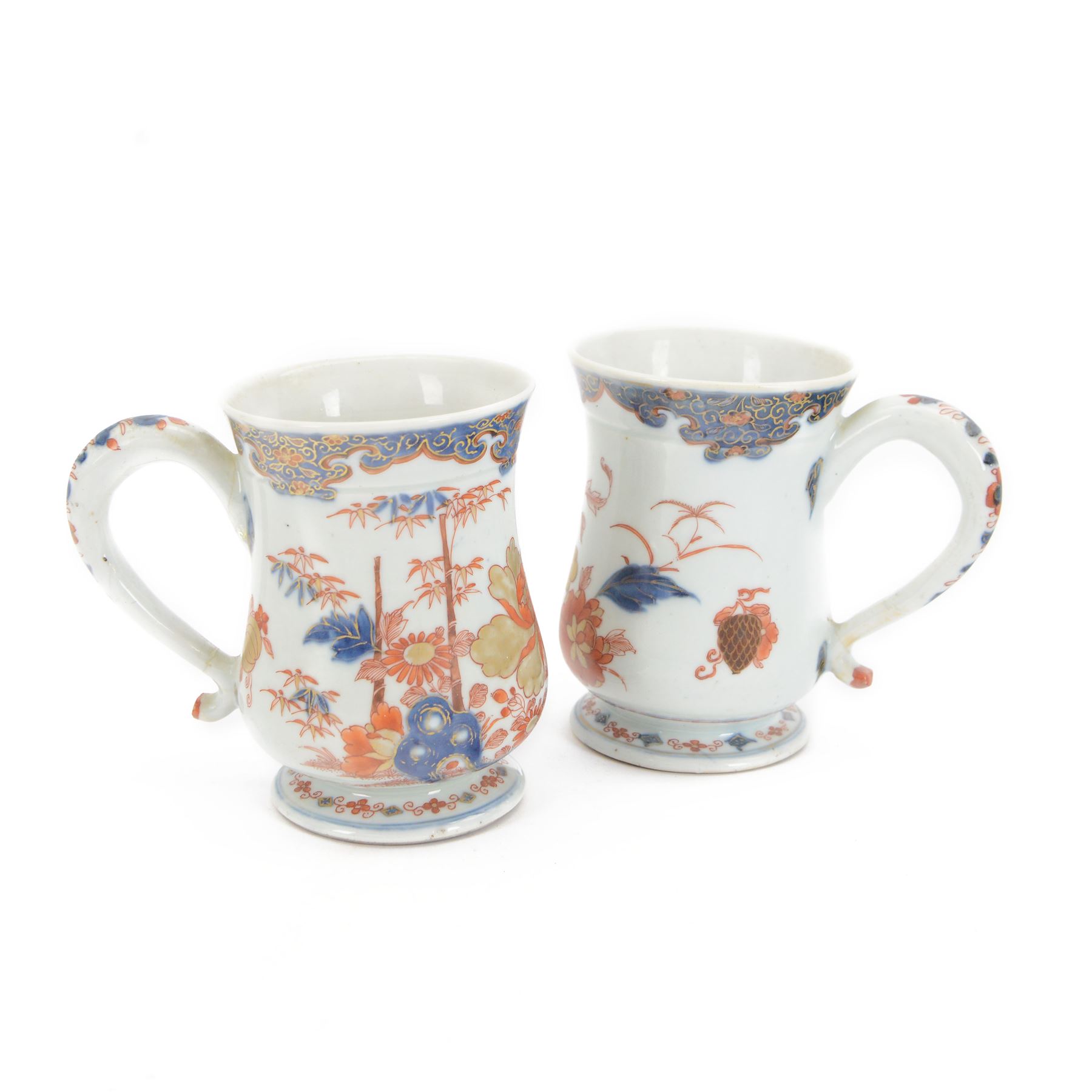 Pair of 18th century Chinese export tankards, each of bellied form with curved handle and circular foot, decorated in the Imari palette with peonies, chrysanthemums and bamboo, H12.5cm