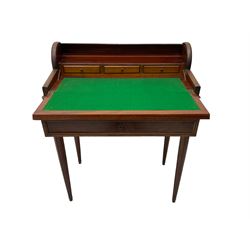 Early 20th century French plum pudding mahogany petite writing desk, barrel tambour roll top, fitted with a single cock-beaded drawer activating the tambour roll, the fold-over writing slope with inset writing surface supported by long drawer, fitted with three small drawers and pen rail, raised on fluted tapering supports