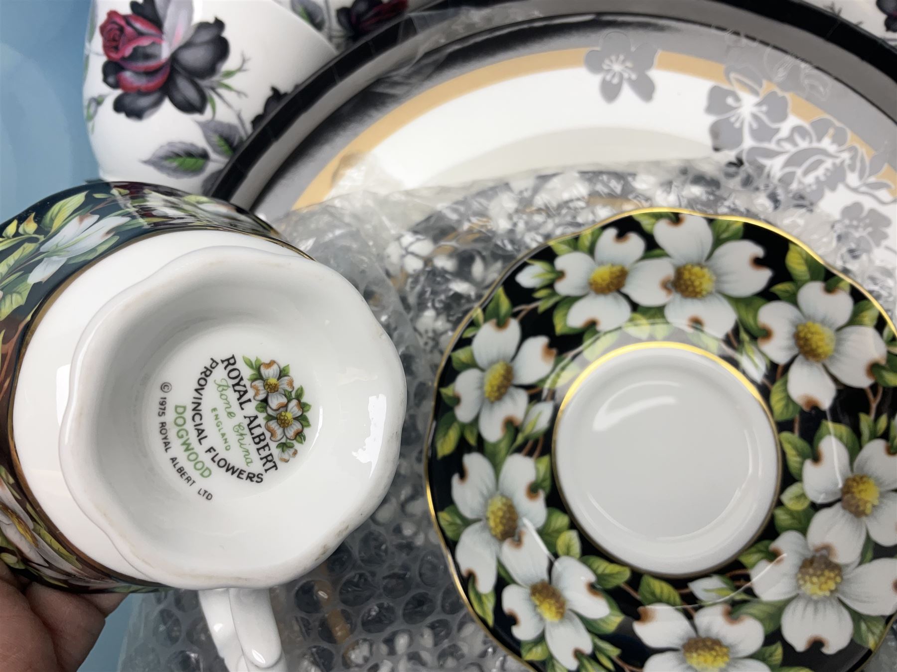 Royal Albert Masquerade pattern tea service for six, together with Royal Albert Dogwood pattern teacup and saucer and Alfred Meakin tea and dinner wares decorated with gilt on cream ground to include lidded tureens and oval serving plates etc in two boxes